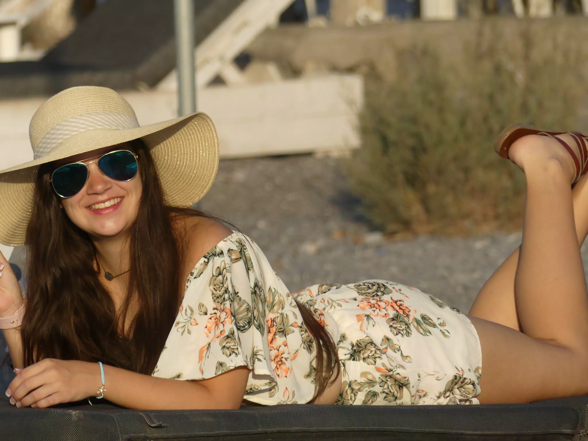 Emily Laying on the Beach on Santorini