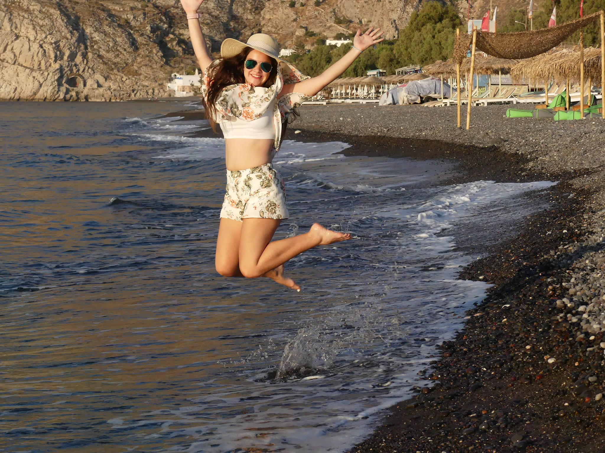 Emily Jumping in the Aegean Sea on Santorini