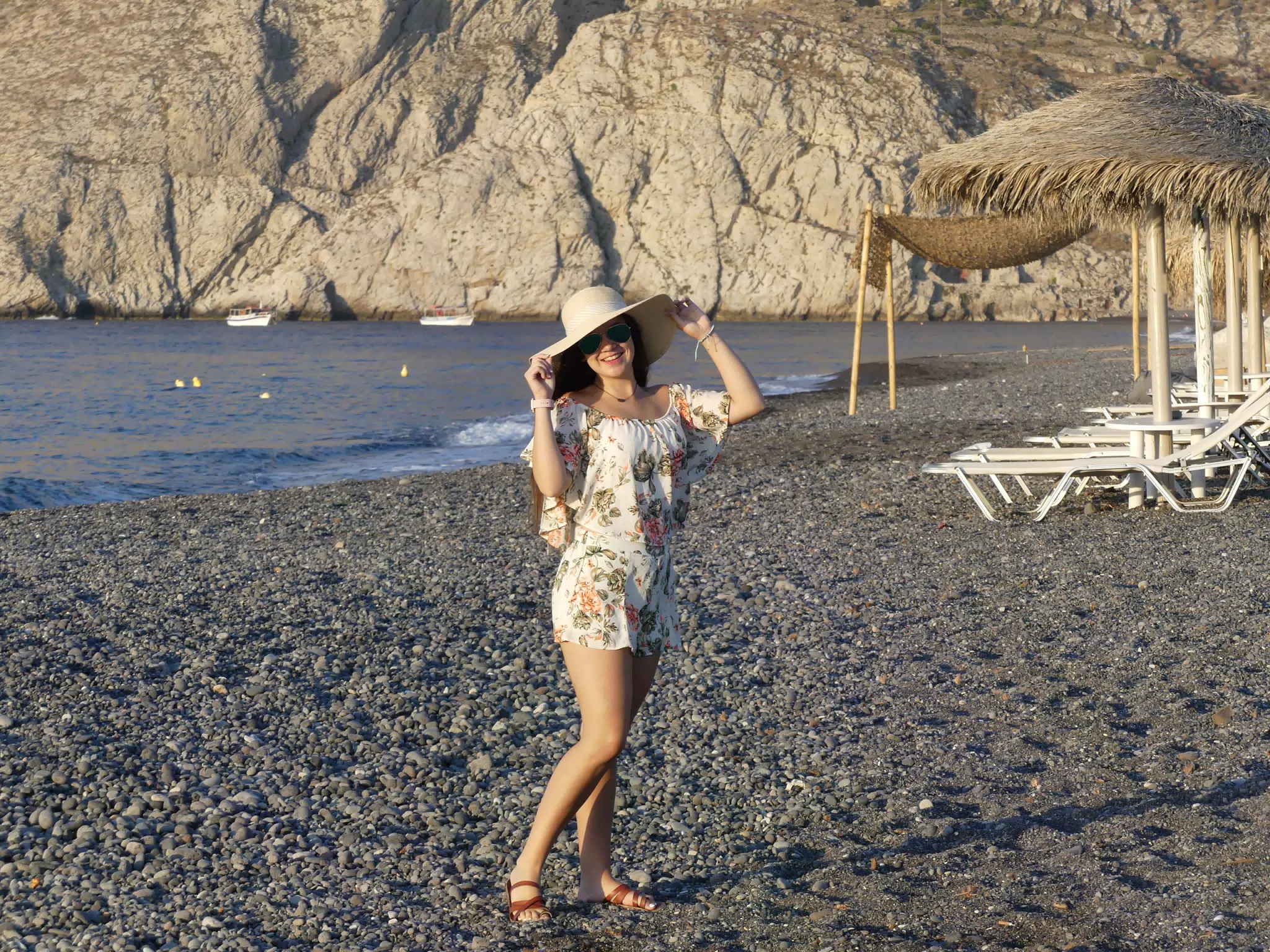 Classic Girl Wearing Hat on Santorini Beach at Kamari