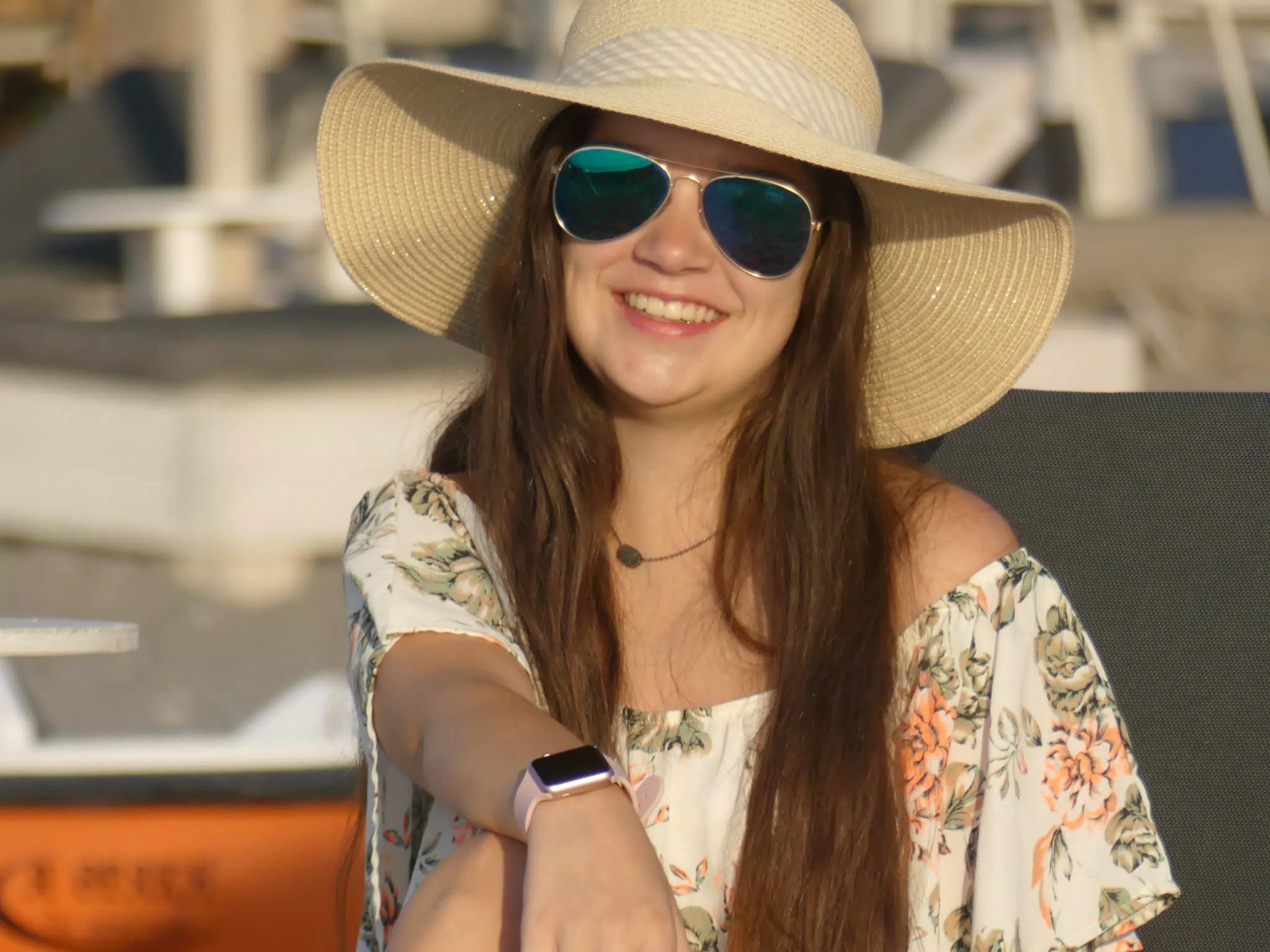 Emily Smiling in Hat and Sunglasses on Beach on Santorini