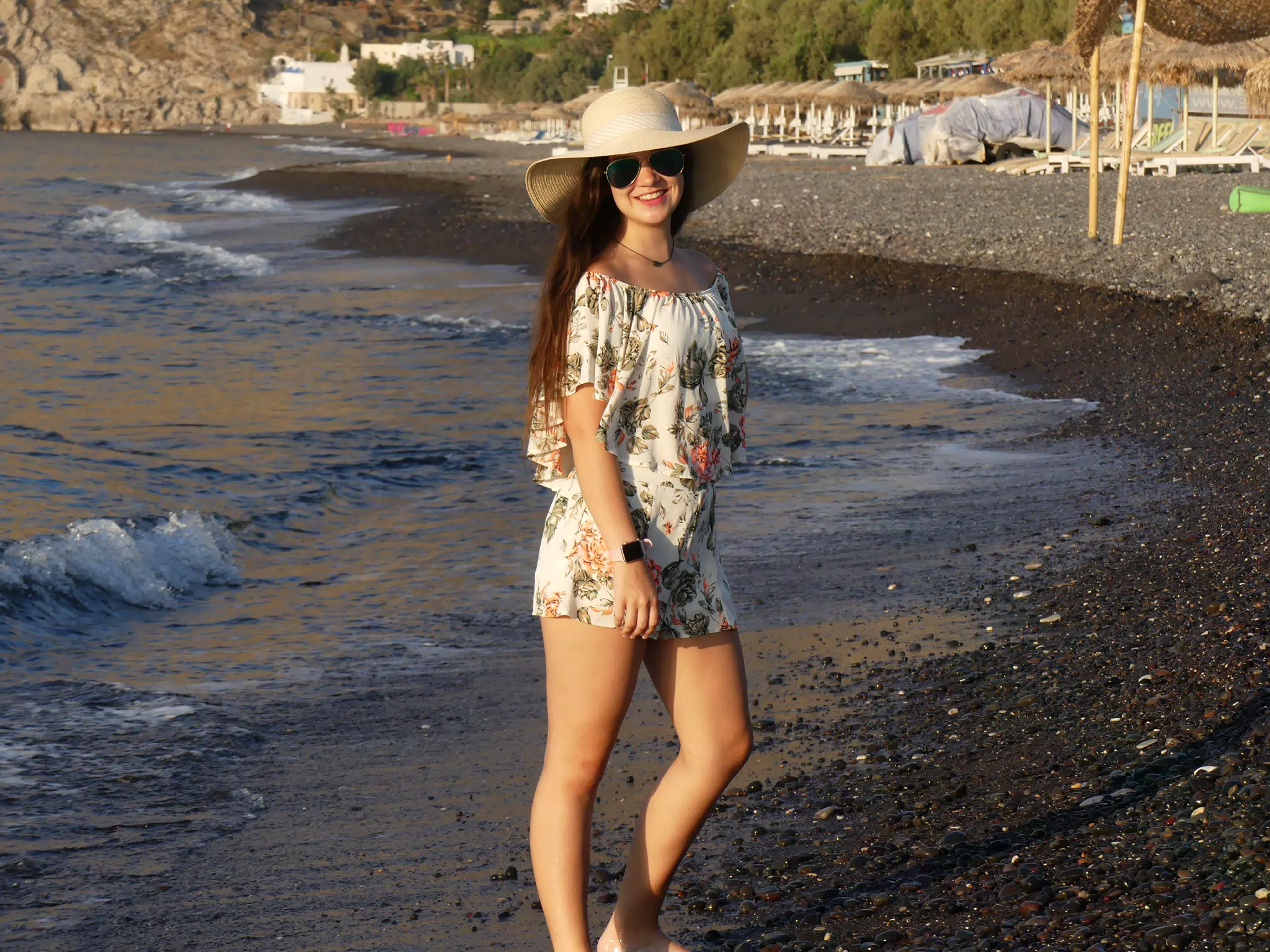 Emily in Hat on Kamari Beach on Santorini
