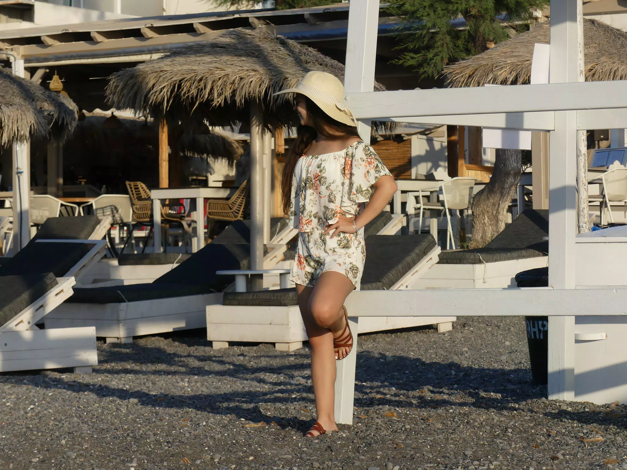 Girl Leaning on Lifeguard Station on Santorini