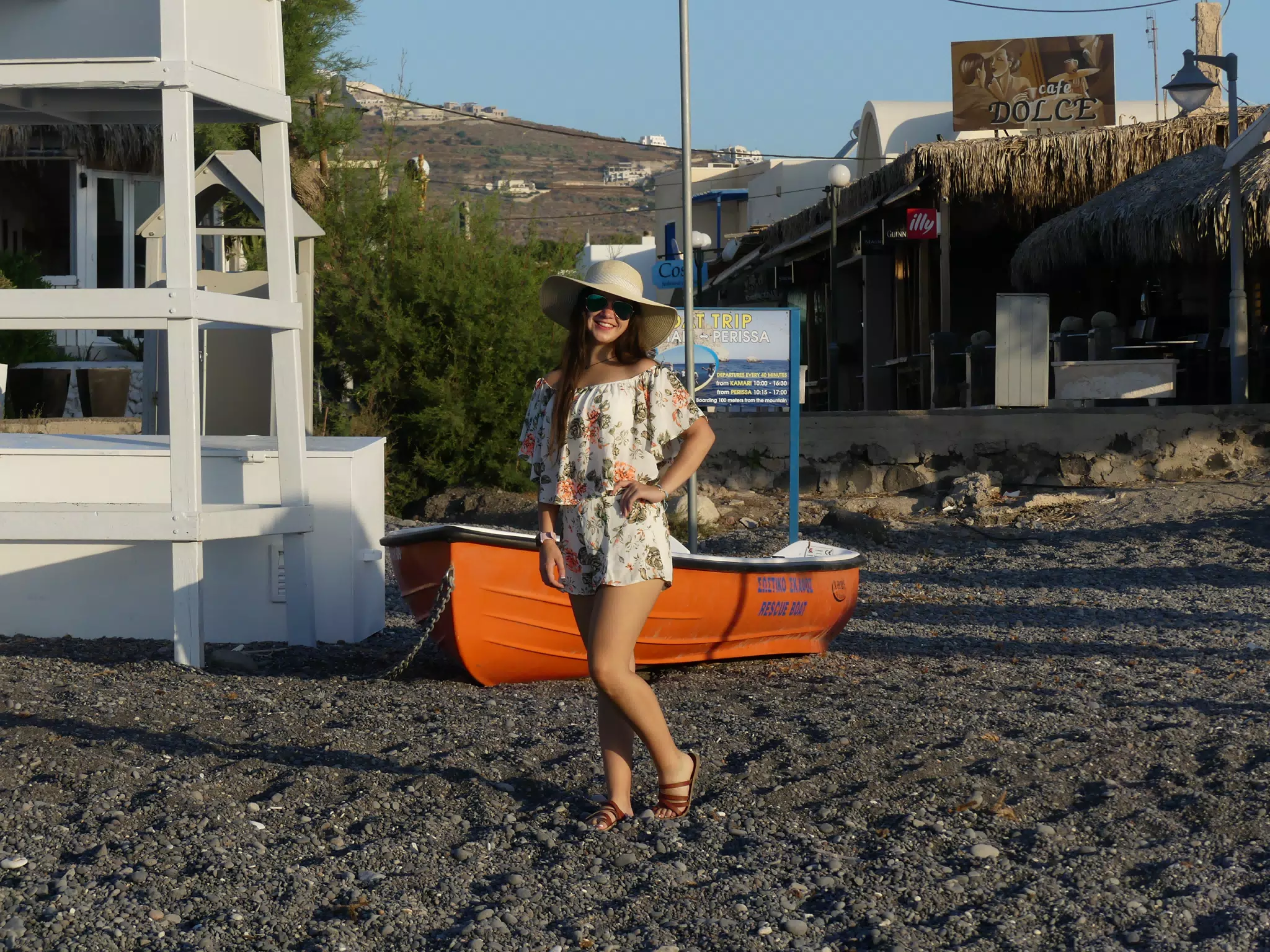 Emily Posing on the Kamari Beach in Hat on Santorini