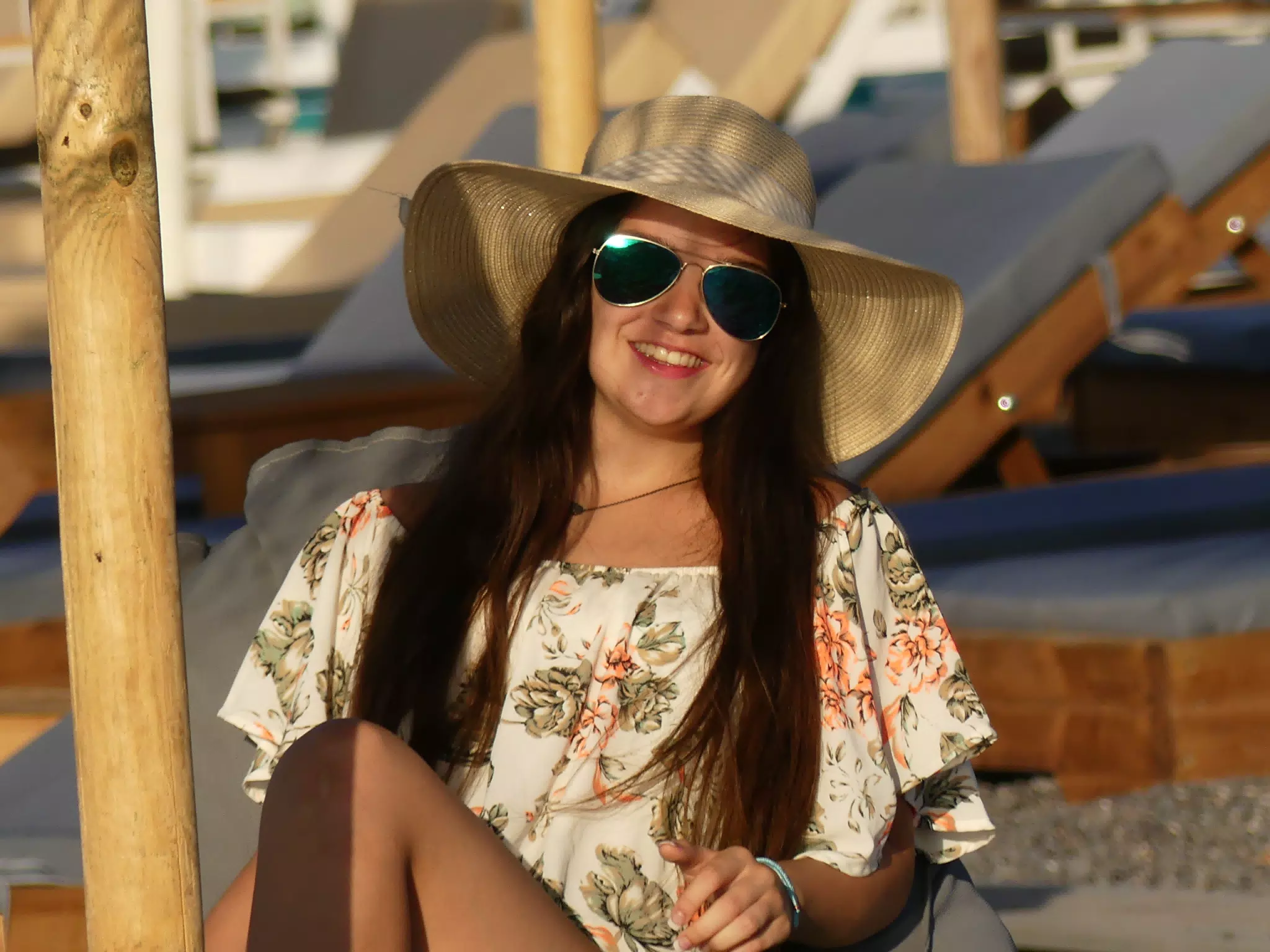 Girl in Hat and Sunglasses