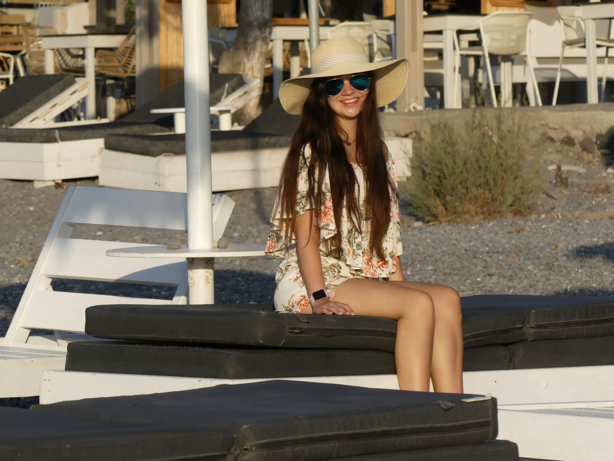 Girl in Hat on Santorini Beach