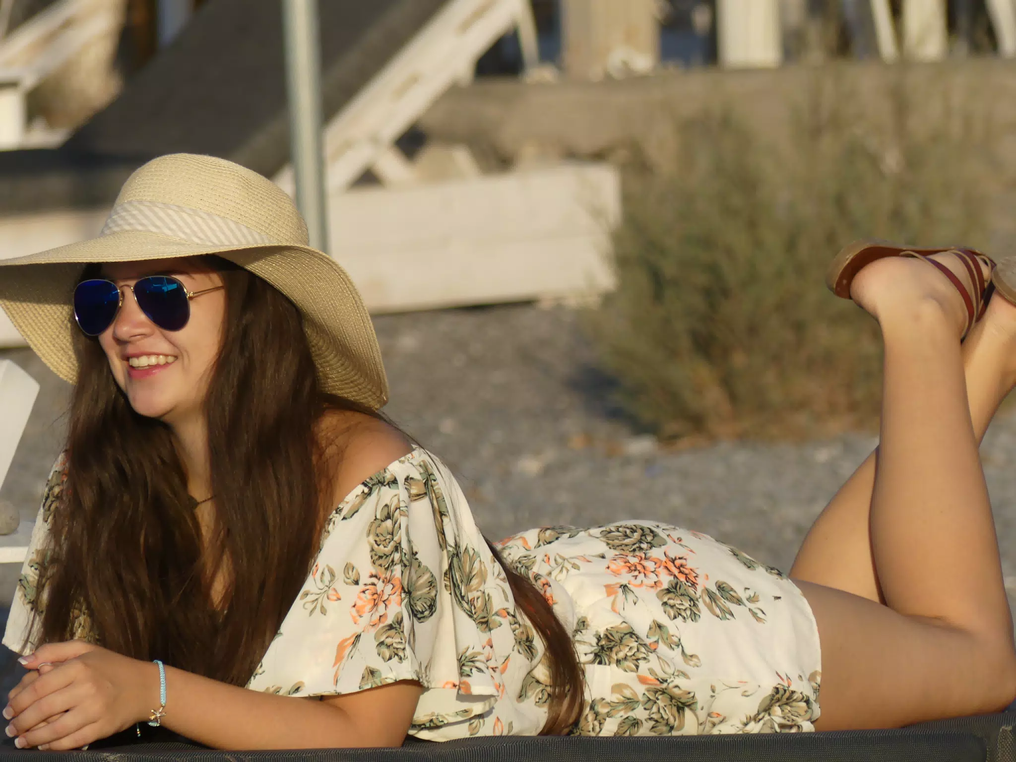 Emily Laying on Chair on Kamari Beach on Santorini