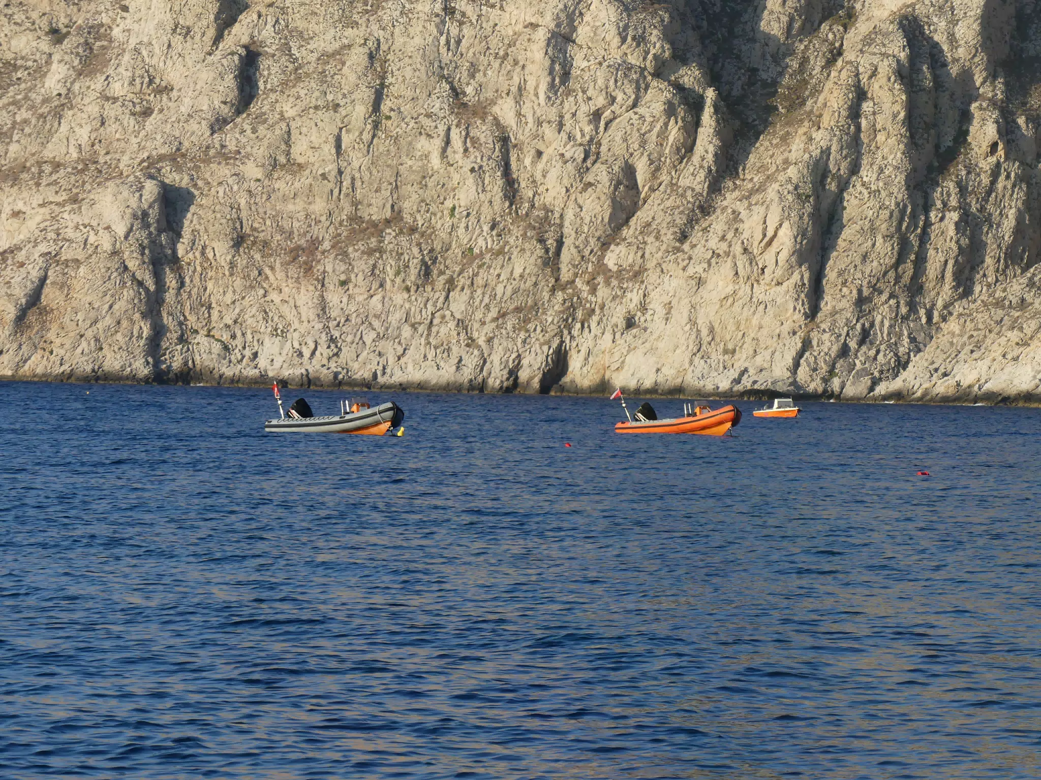 Boats in Aegean Sea off Kamari on Santorini