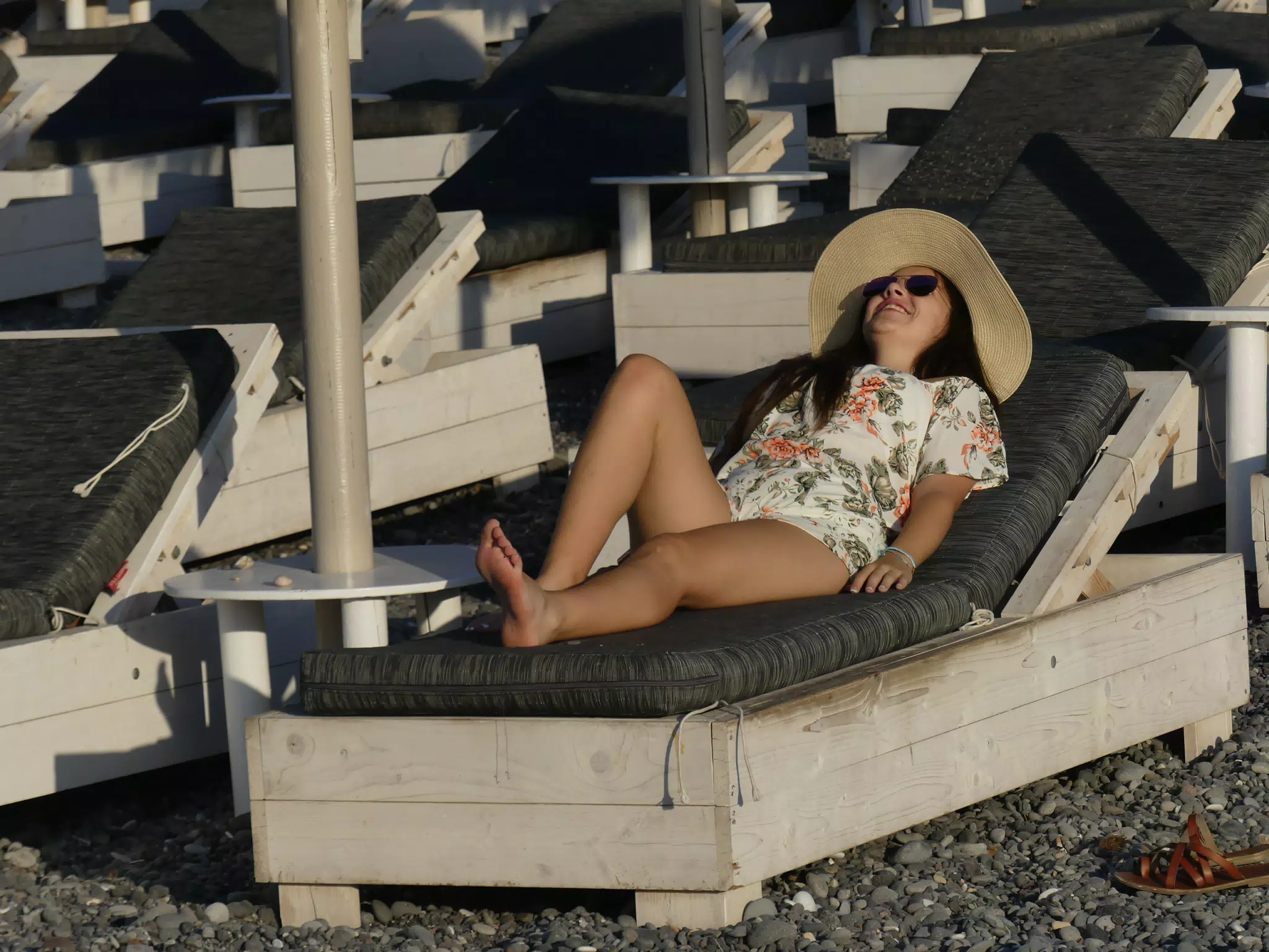 Girl Tanning on Santorini Beach