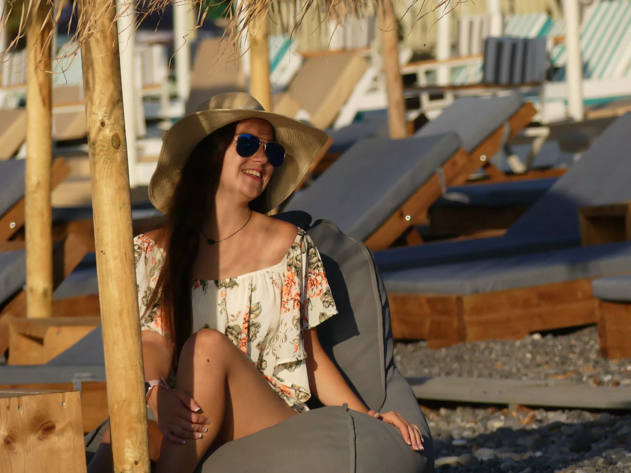 Emily Sitting on Kamari Beach Cushion