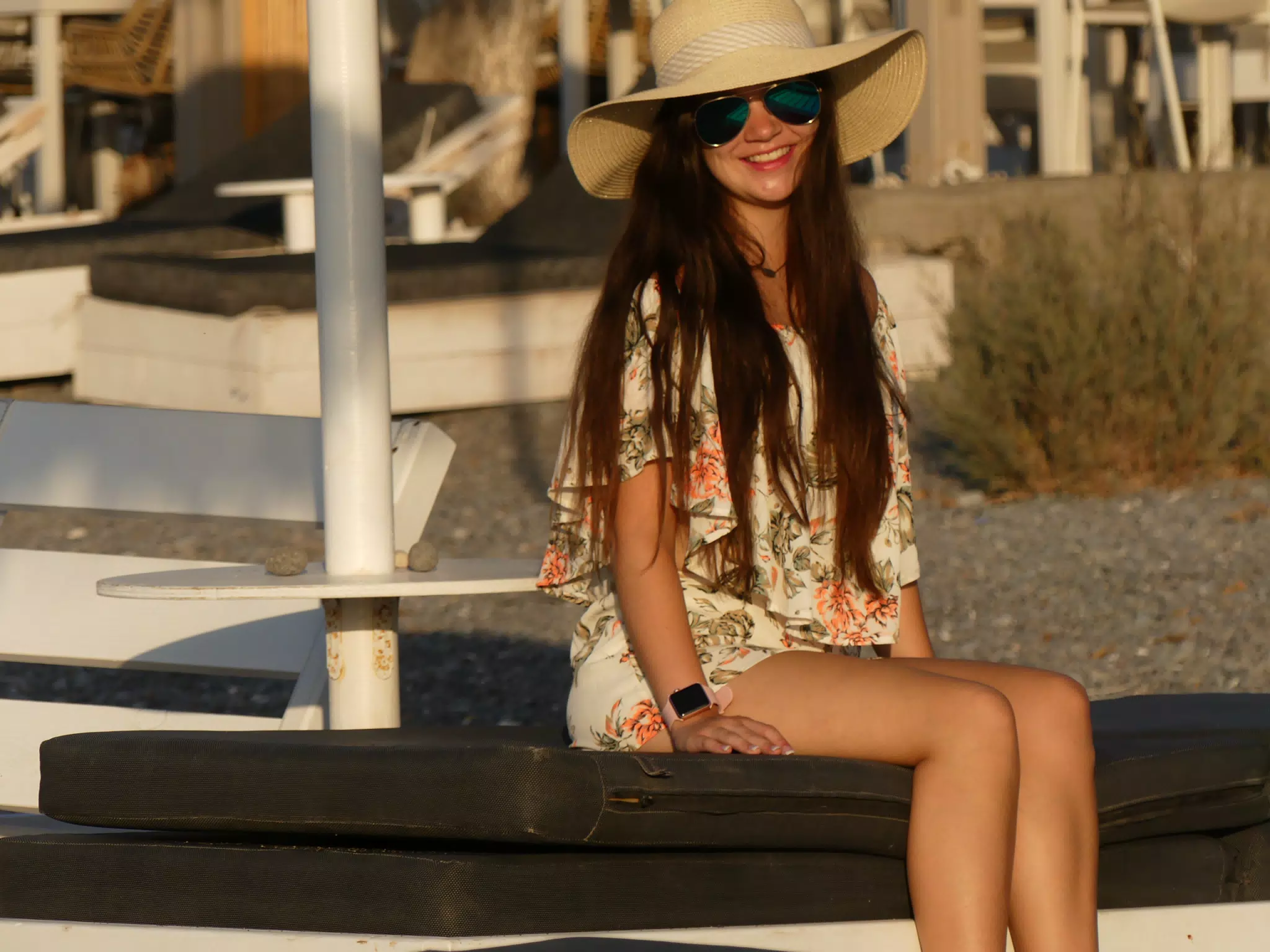 Girl Sitting on Santorini Beach