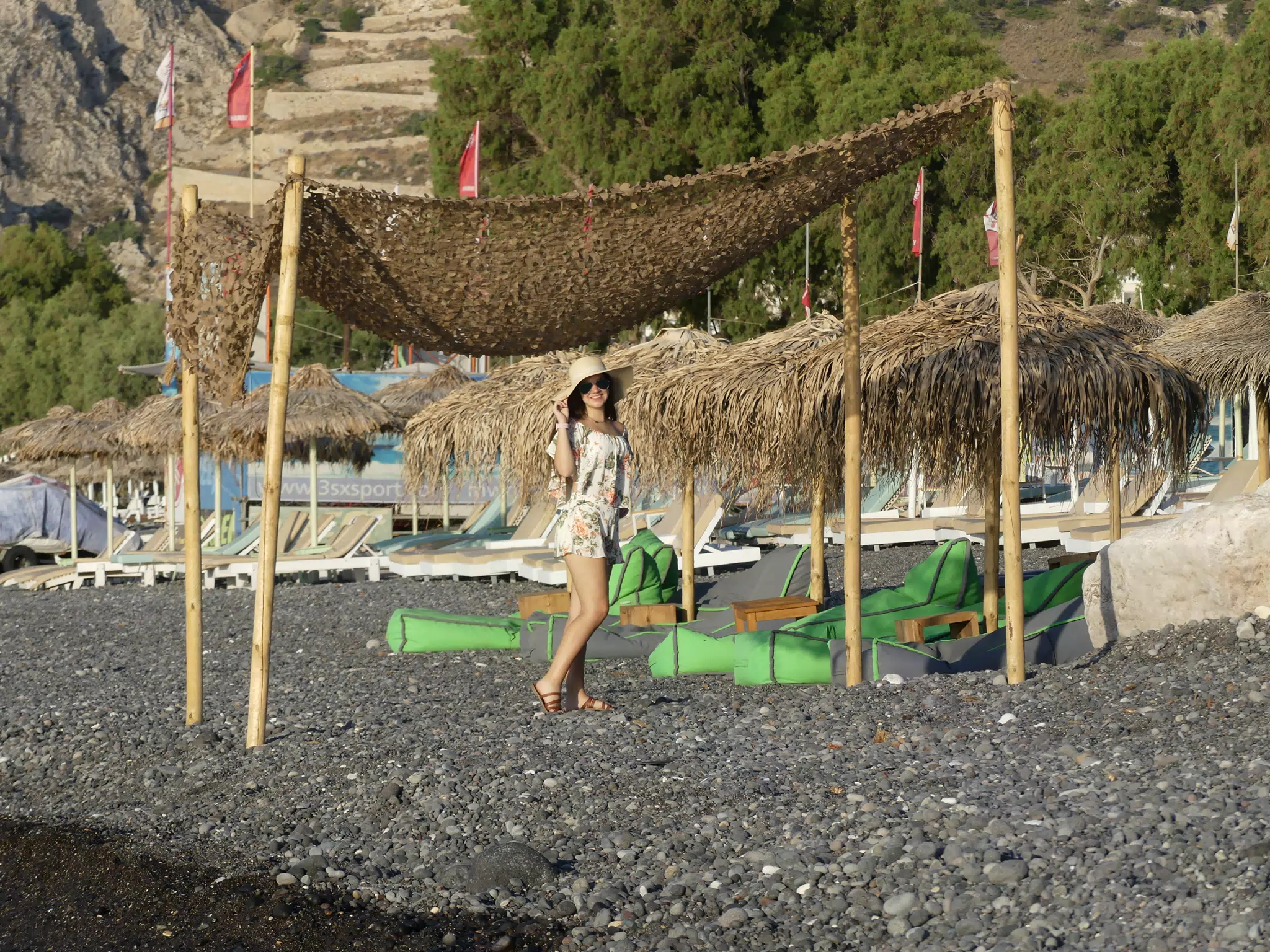 Emily Posting in Hat on Kamari Beach on Santorini