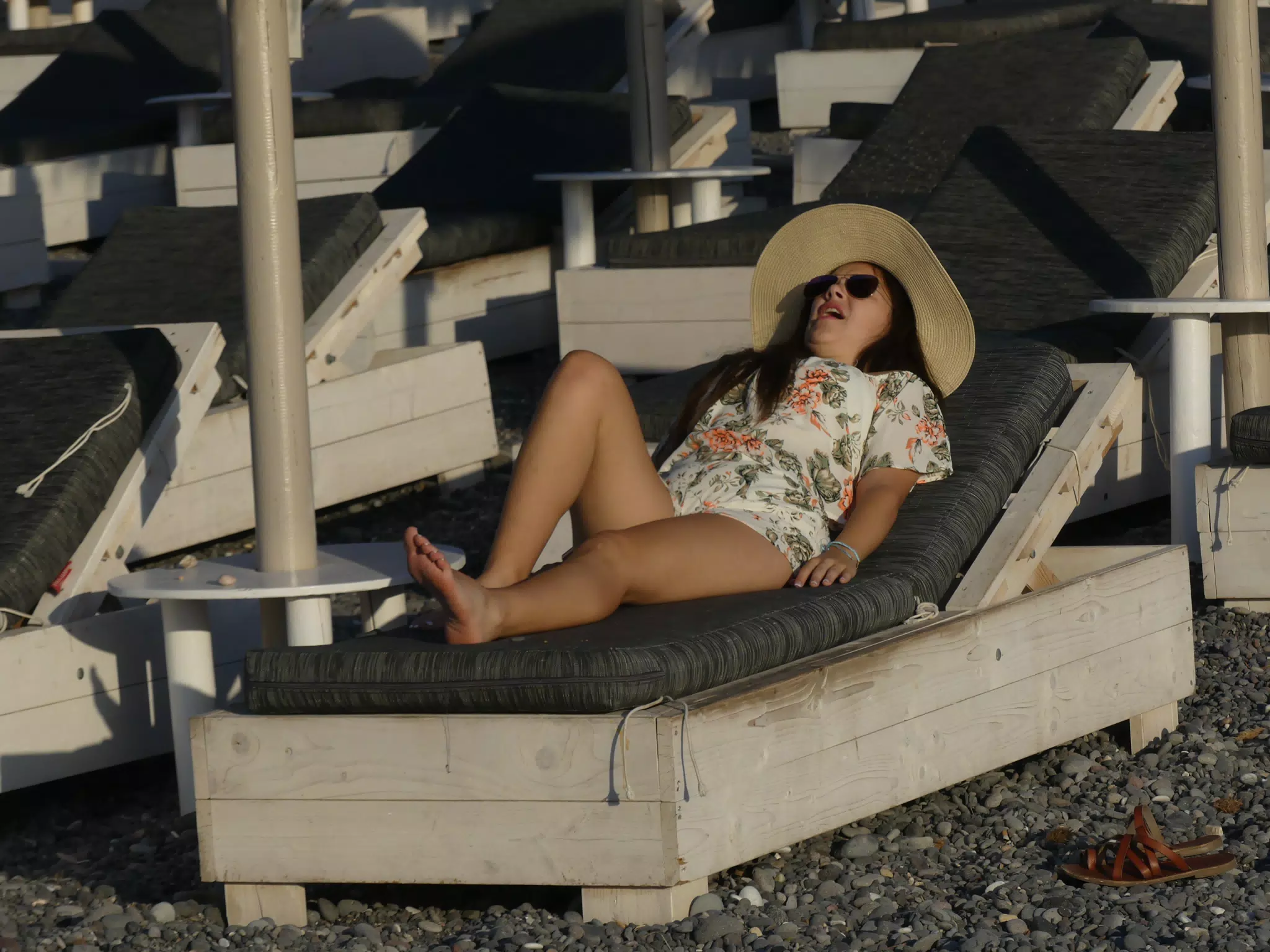 Girl Napping on Santorini Beach