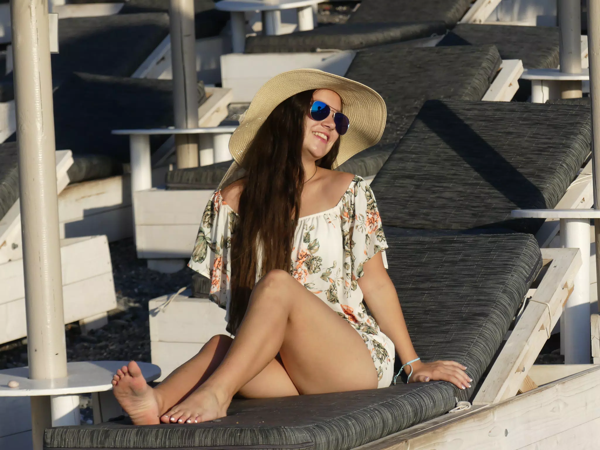 Emily on Chair on Kamari Beach on Santorini