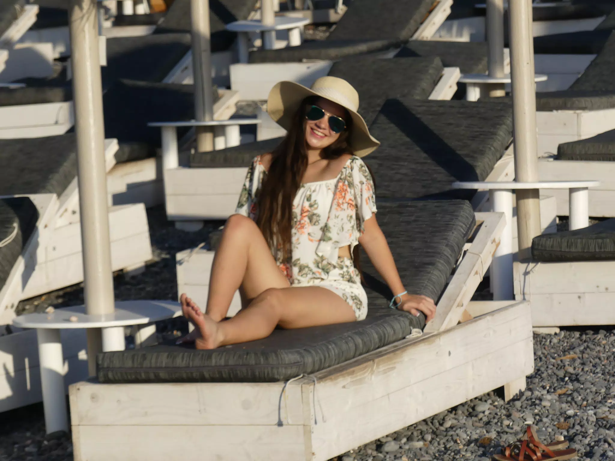 Girl Relaxing on Kamari Beach on Santorini