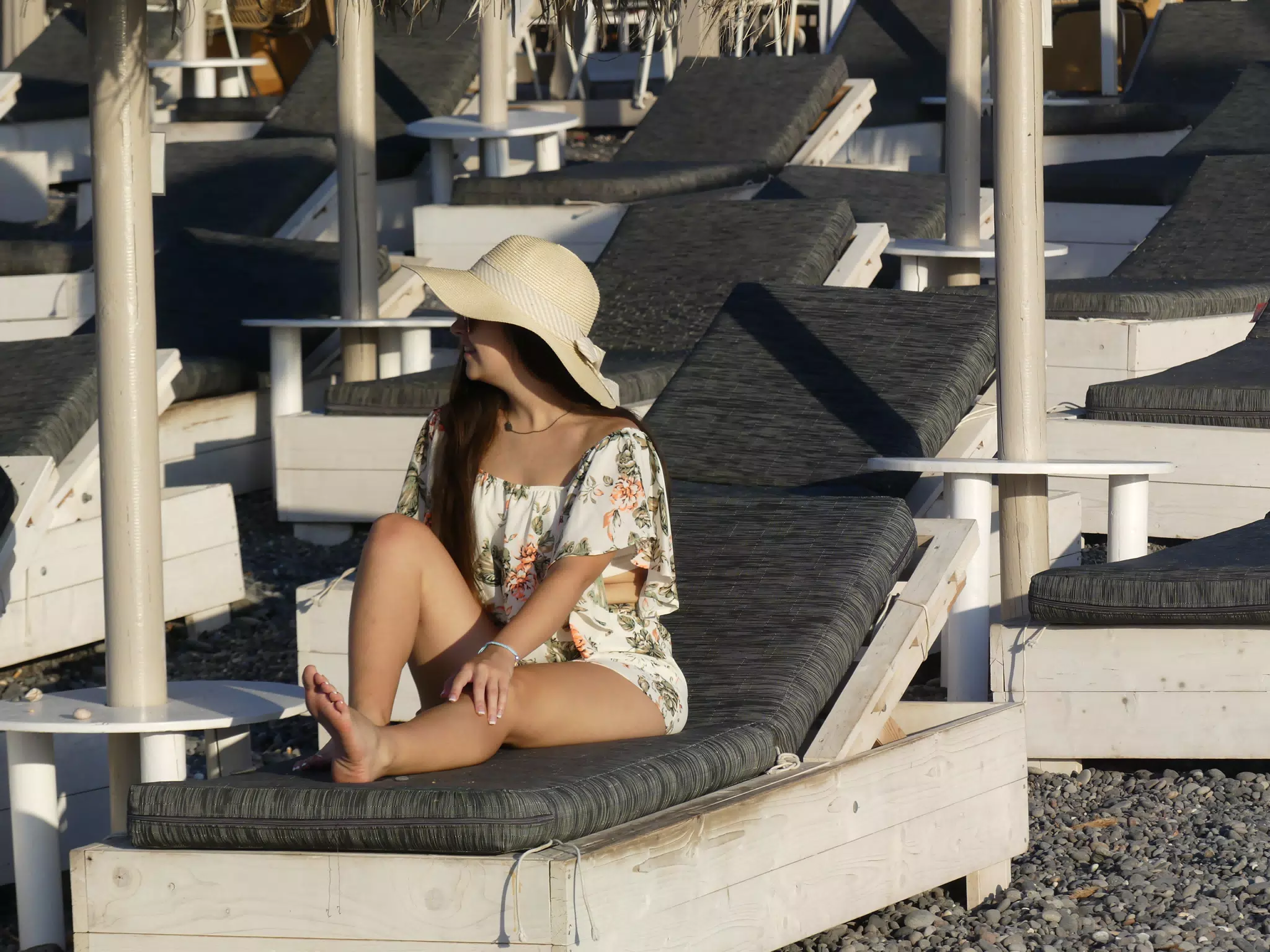 Girl on Kamari Beach Chair