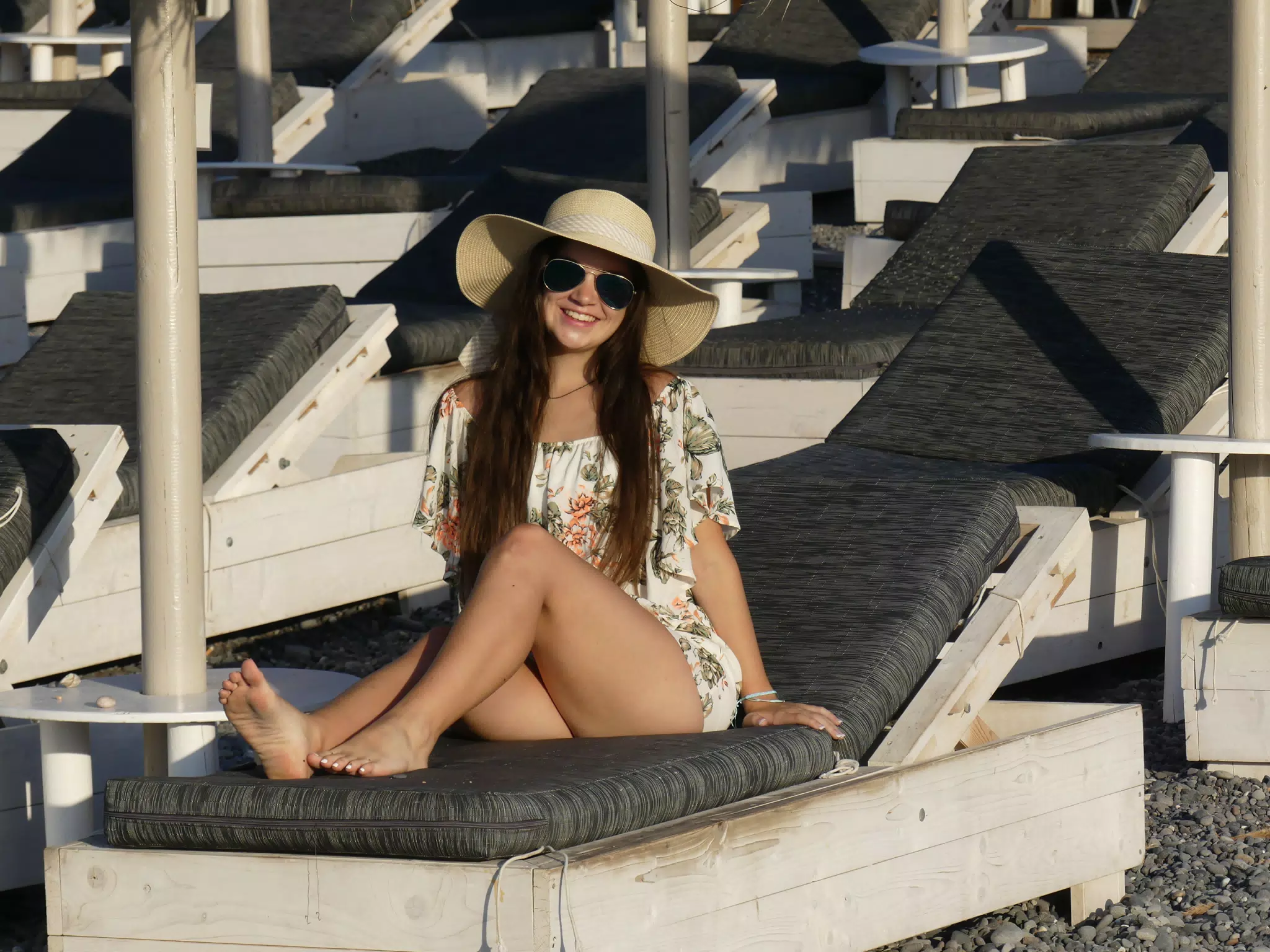 Emily on Lounge Chair on Kamari Beach on Santorini