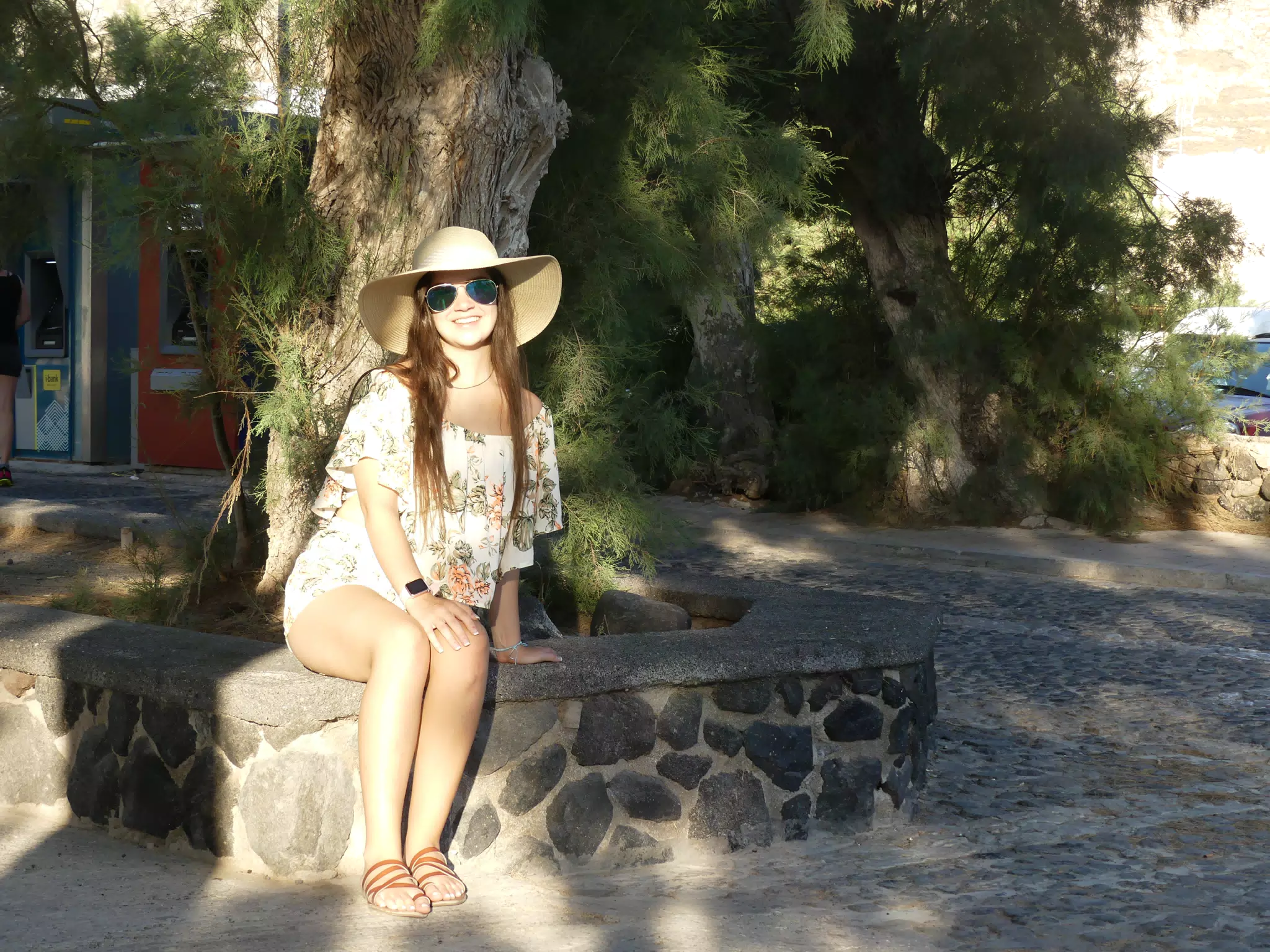 Emily Sitting Under Tree at Kamari Beach