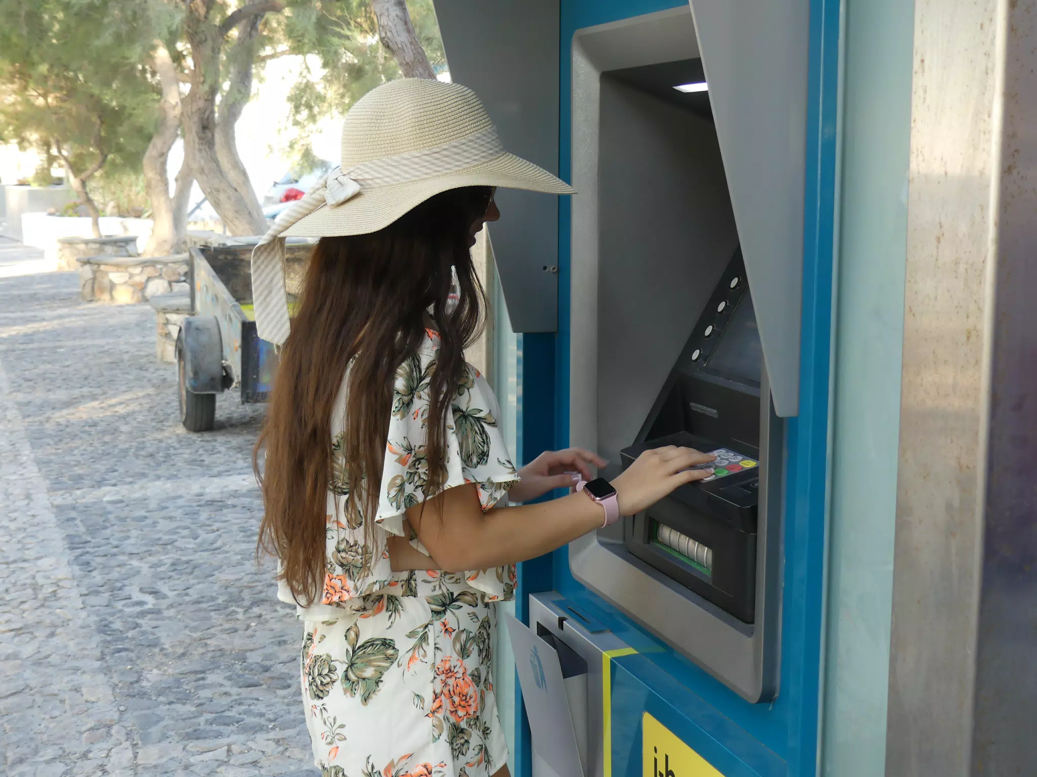 Girl at ATM