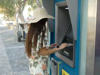 Girl at ATM