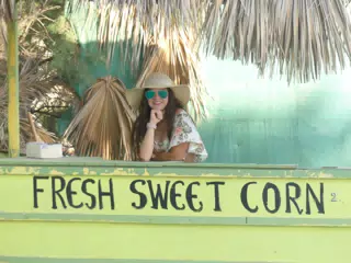Teen Selling Corn