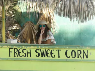 Girl Selling Corn on Santorini