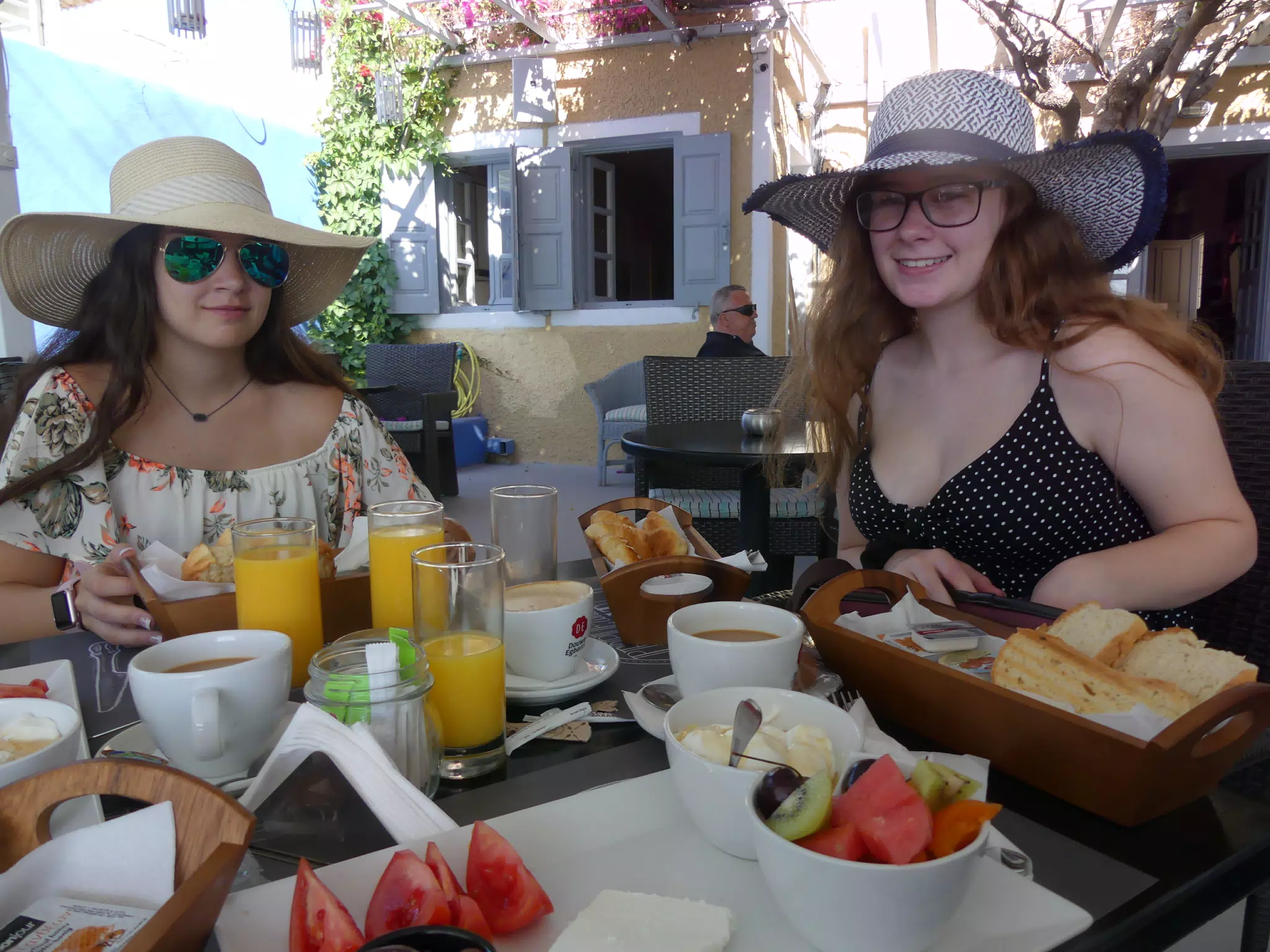 Emily and Madeline Having Breakfast on Kamari Beach on Santorini