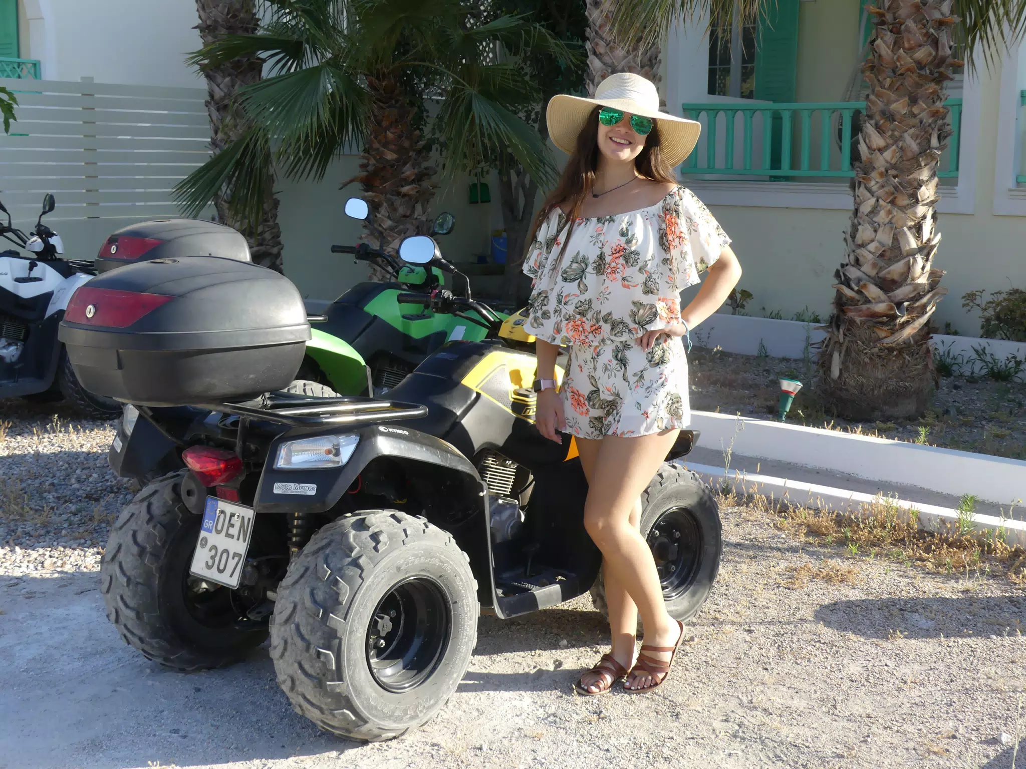 Teen Girl by ATV on Santorini