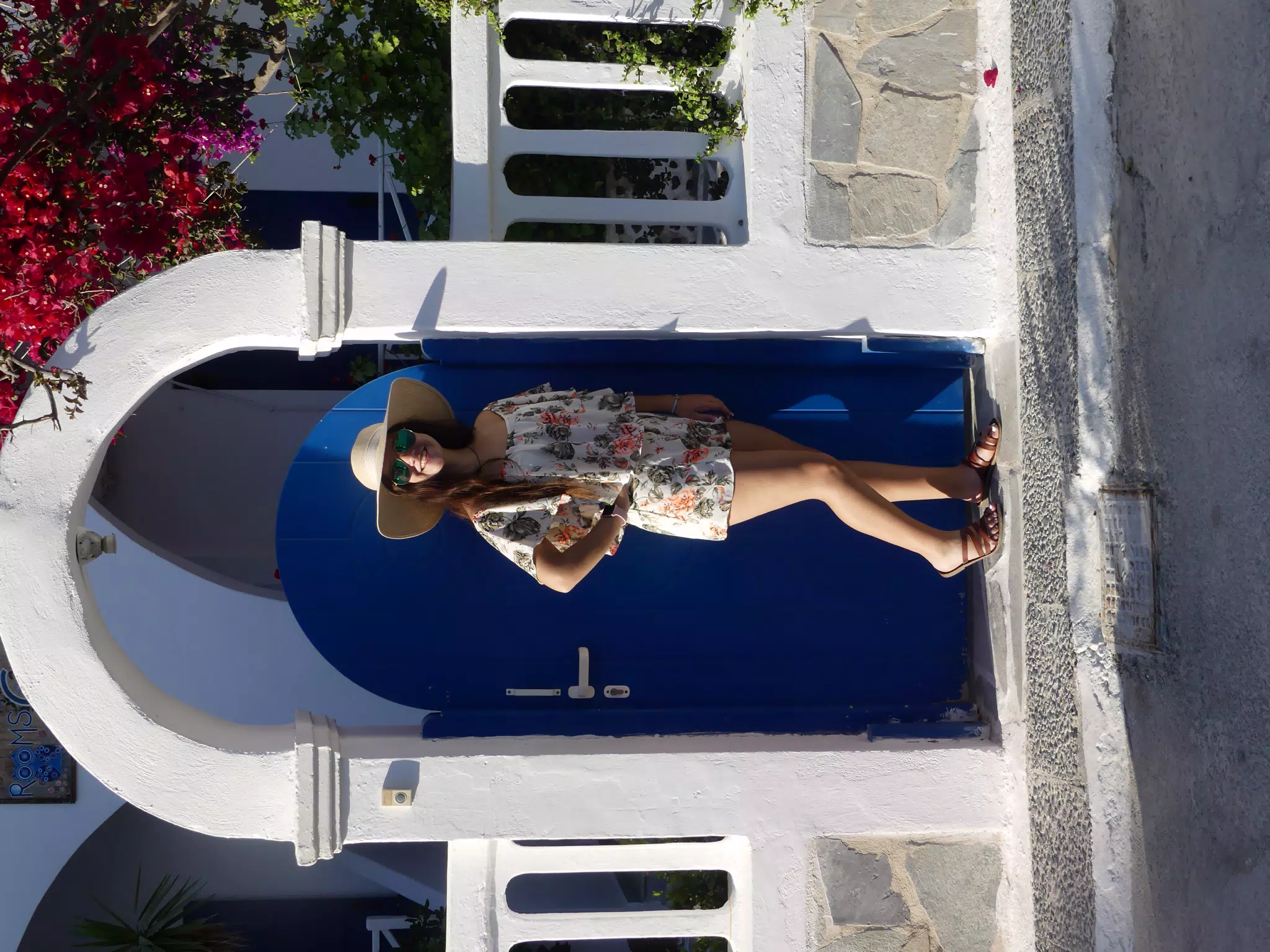 Emily in Front of Blue Door in Kamari