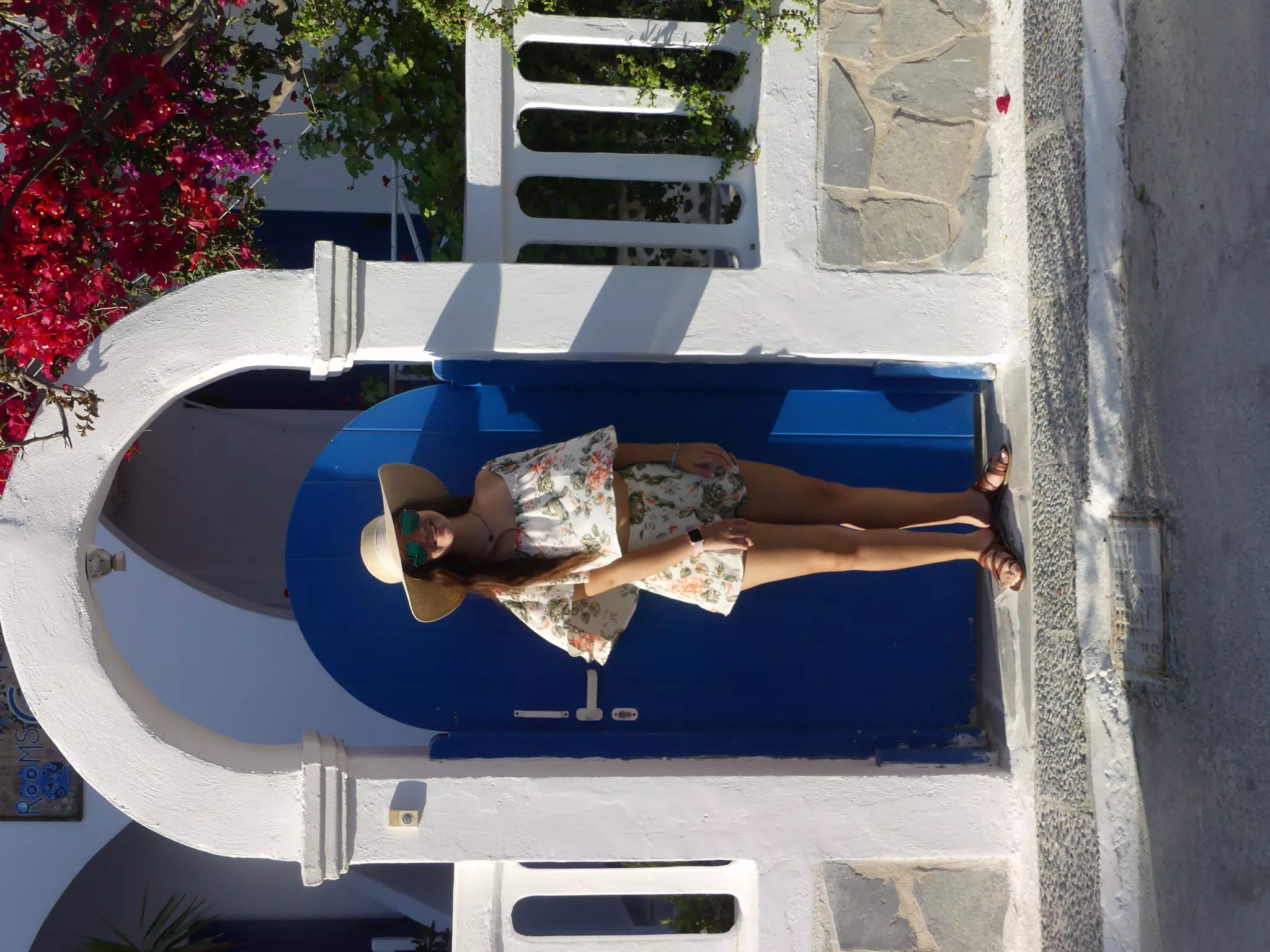 Emily in Front of Blue Door in Kamari