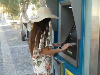 Girl at Cash Machine