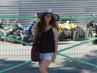 Madeline with ATVs and Scooters on Santorini