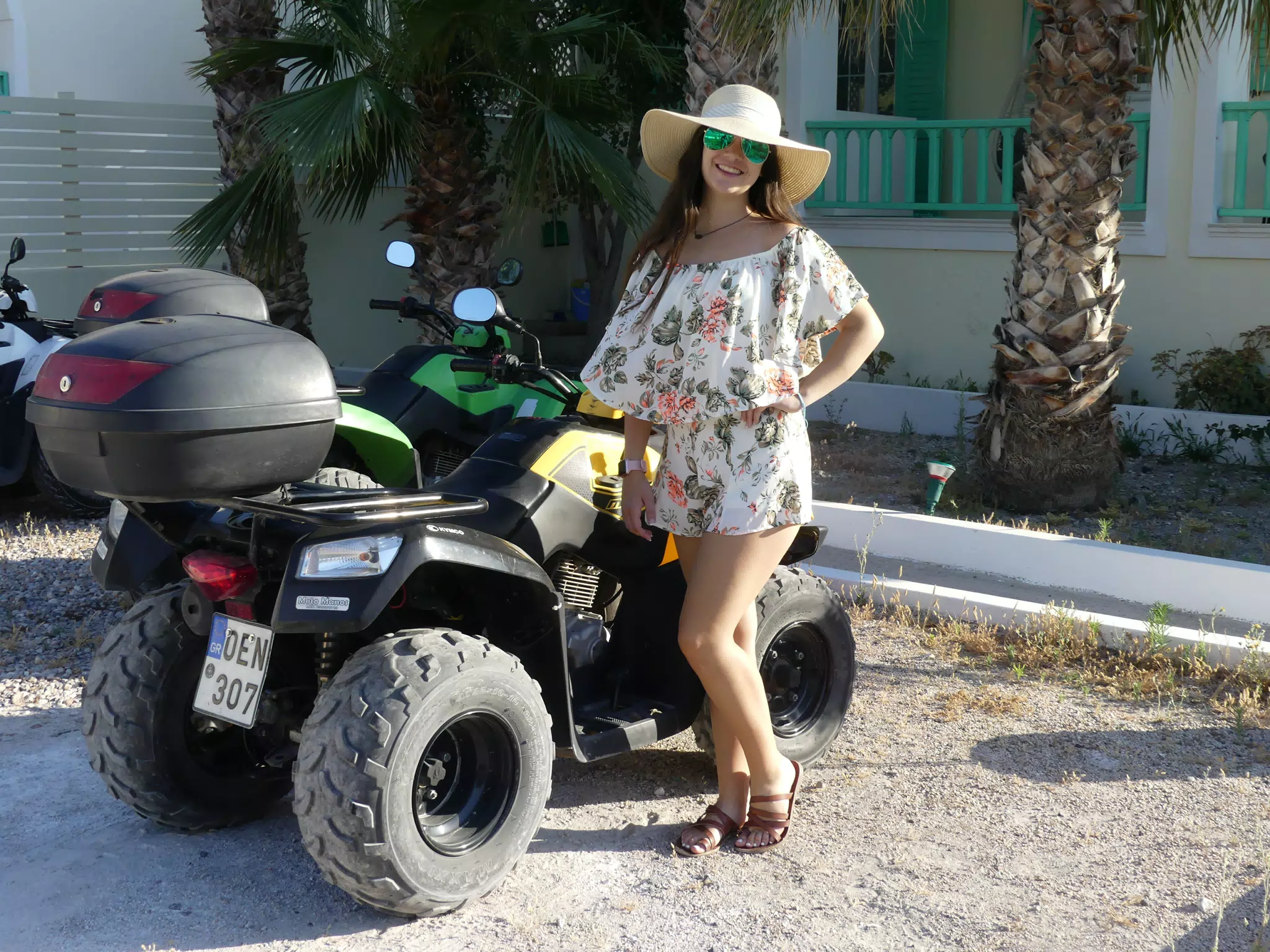 Teen Girl by ATV on Santorini