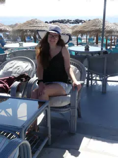 Girl in Hat on Santonrini Beach