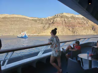 Emily Watching Santorini Fade Away