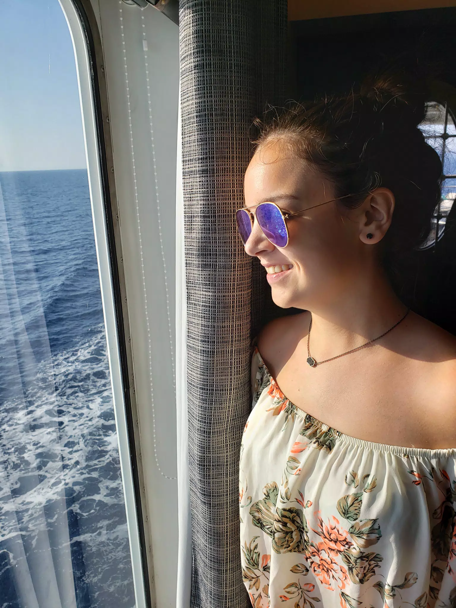 Emily Grice by Ship Window on Ferry on Aegean Sea