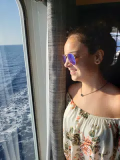 Emily Grice by Ship Window on Ferry on Aegean Sea