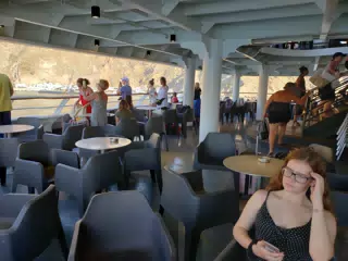 Madeline Riding Ferry from Santorini
