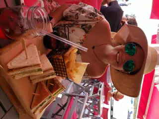 Emily with Sandwiches on Santorini
