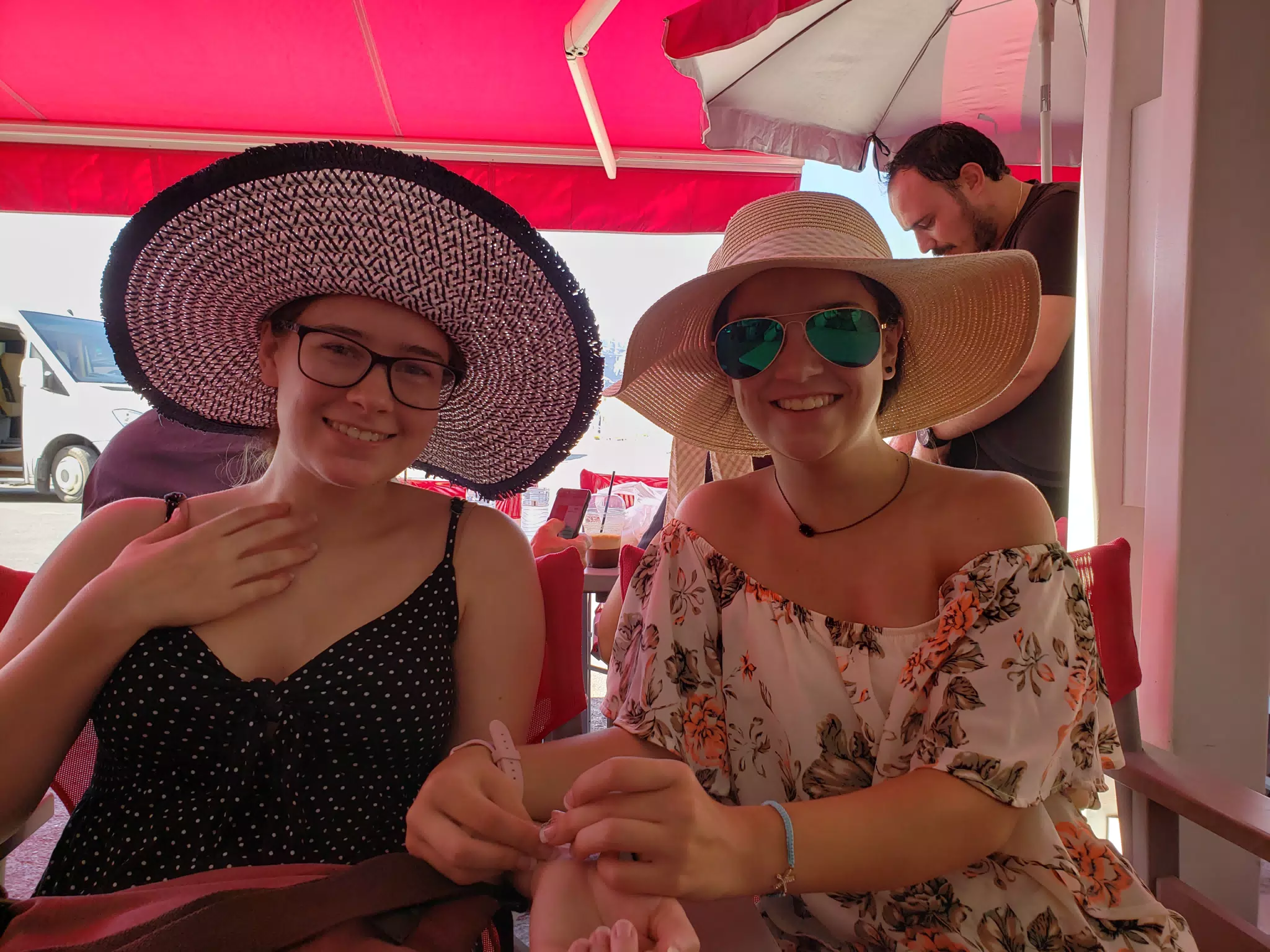 Madeline & Emily Waiting for Lunch on Santorini