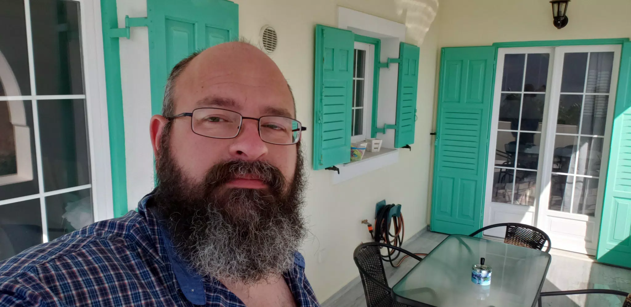 Scott at Kamari Apartment Porch