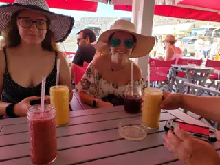 The Girls Waiting for Last Lunch on Santorini