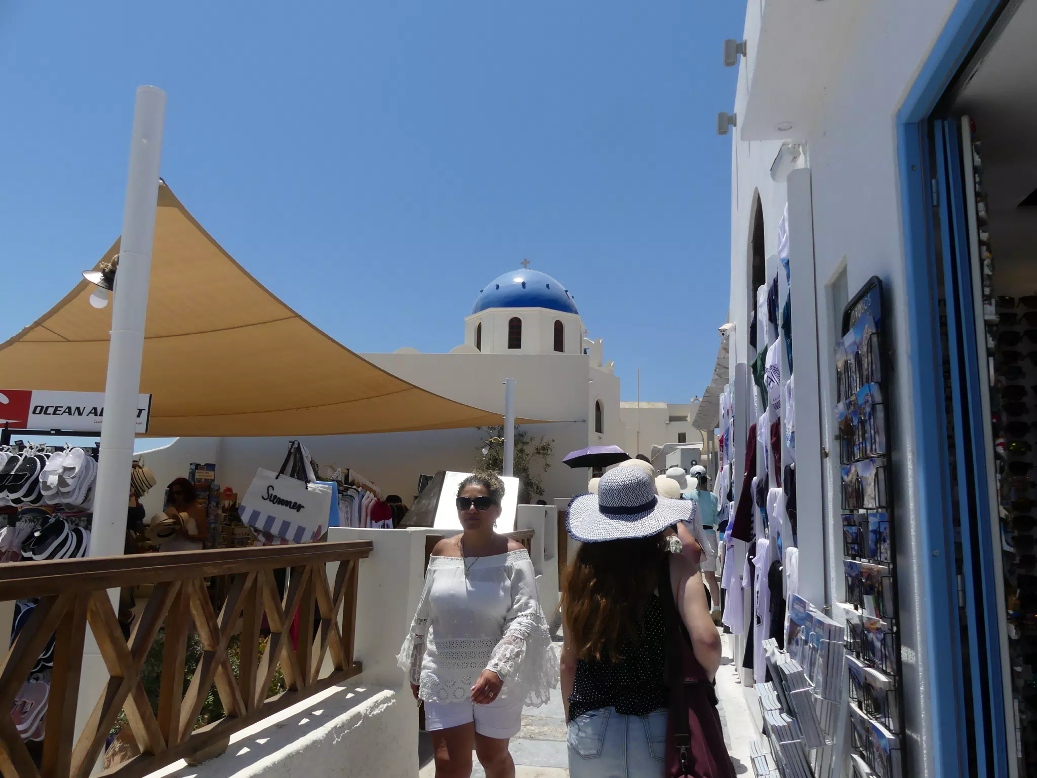 Madeline Walking through Oia