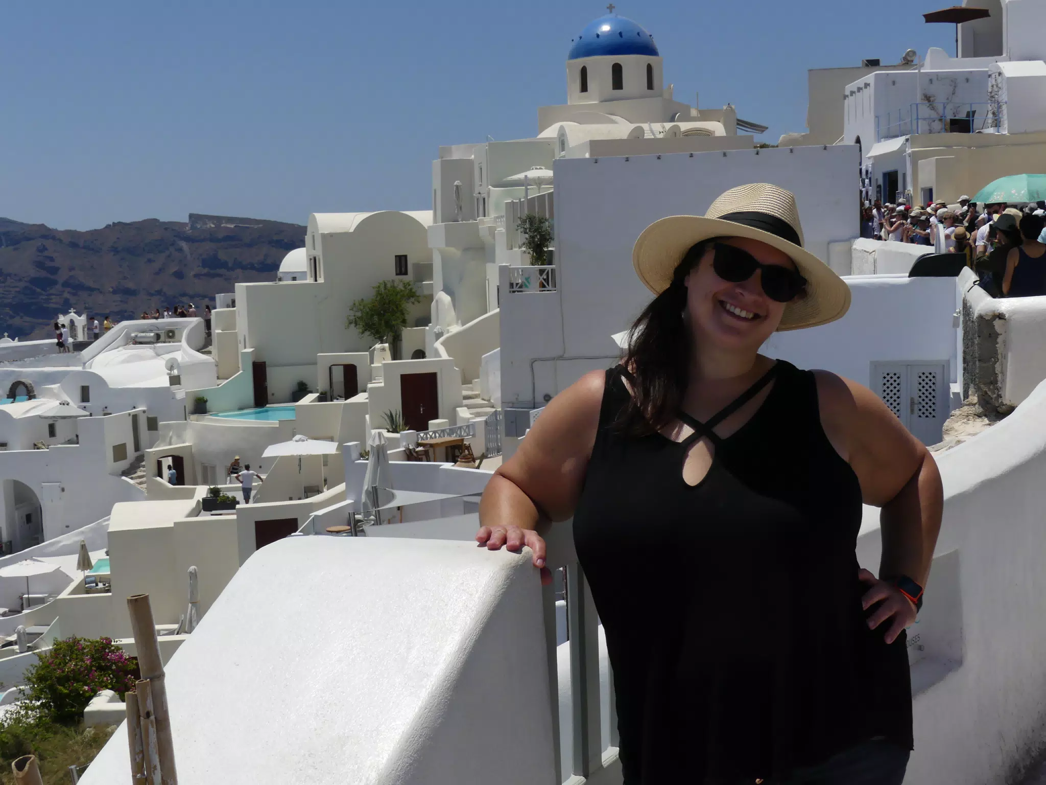 Dominica in Hat in Oia, Santorini