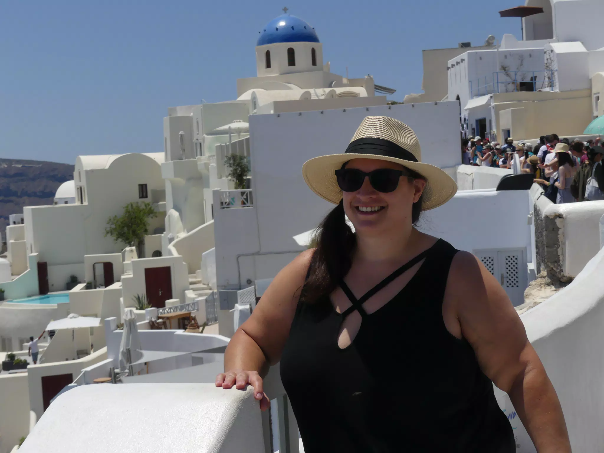Dominica in Hat in Oia, Santorini