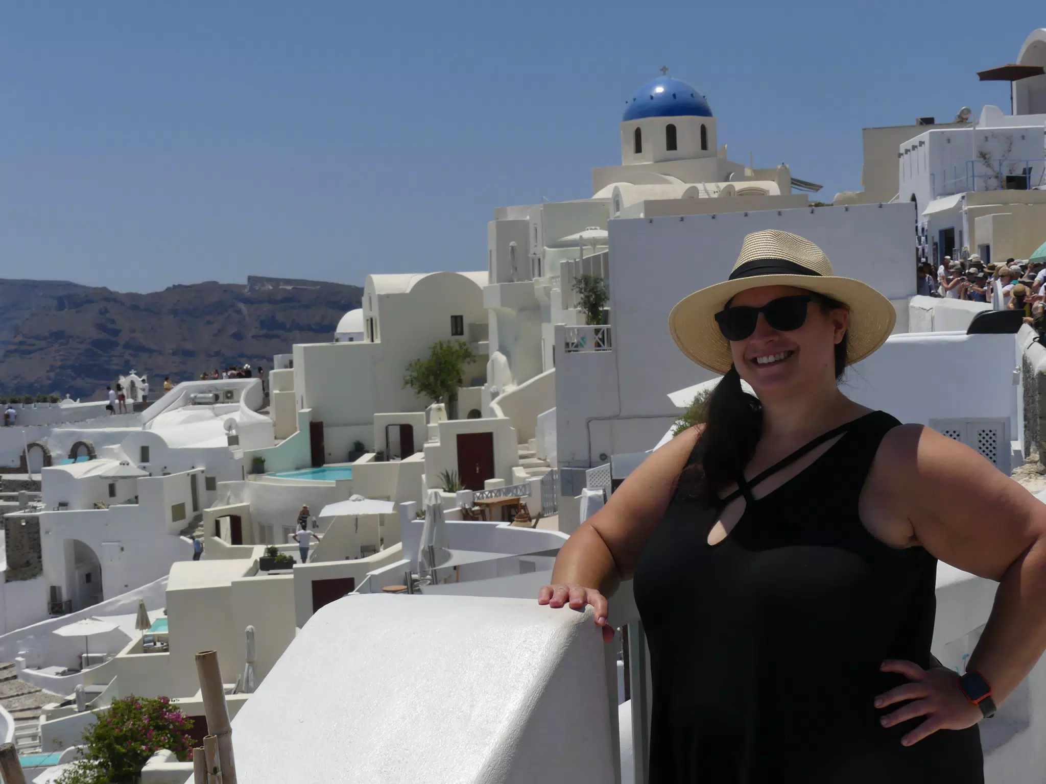 Dominica in Hat in Oia, Santorini