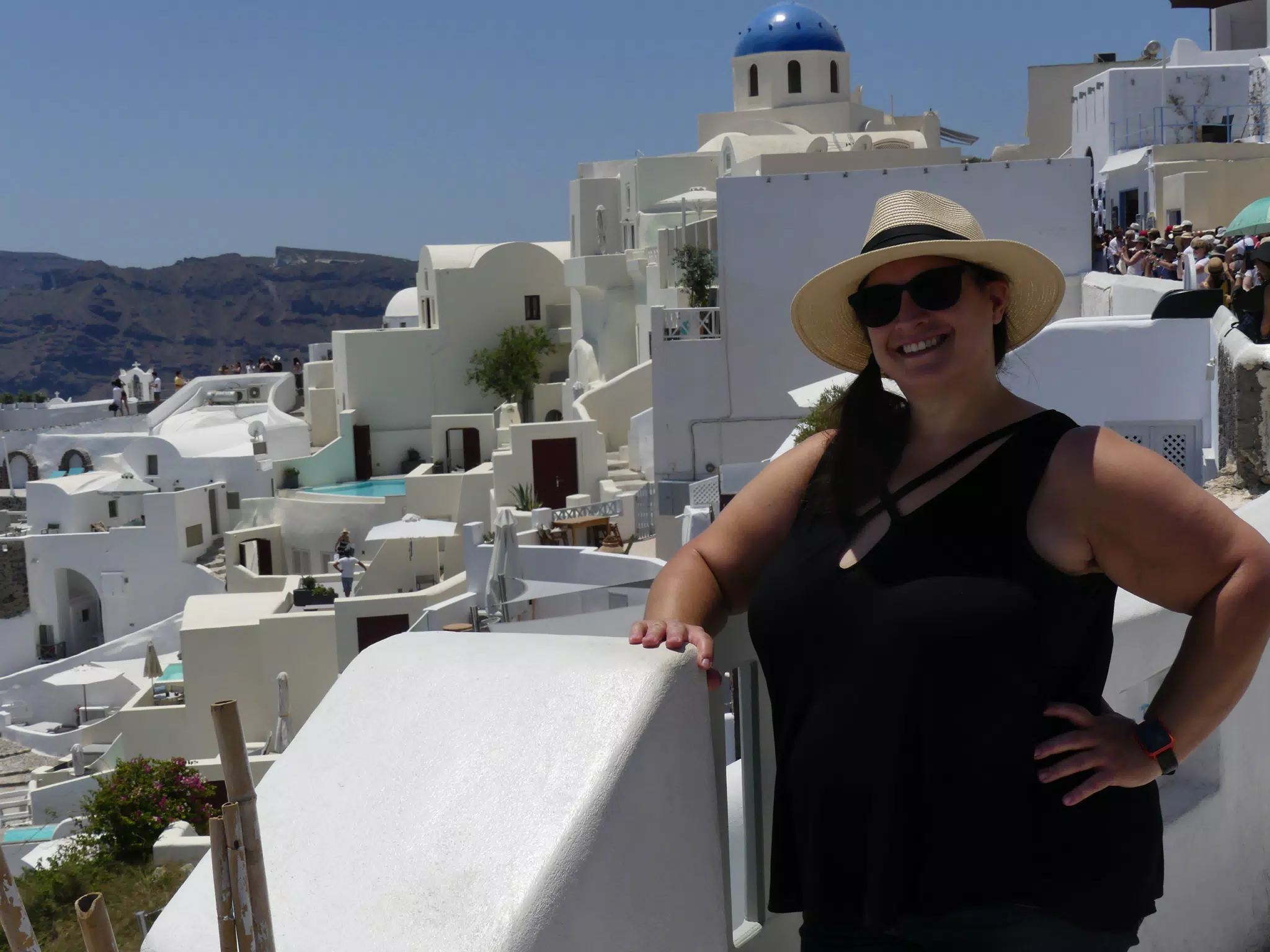 Dominica in Hat in Oia, Santorini