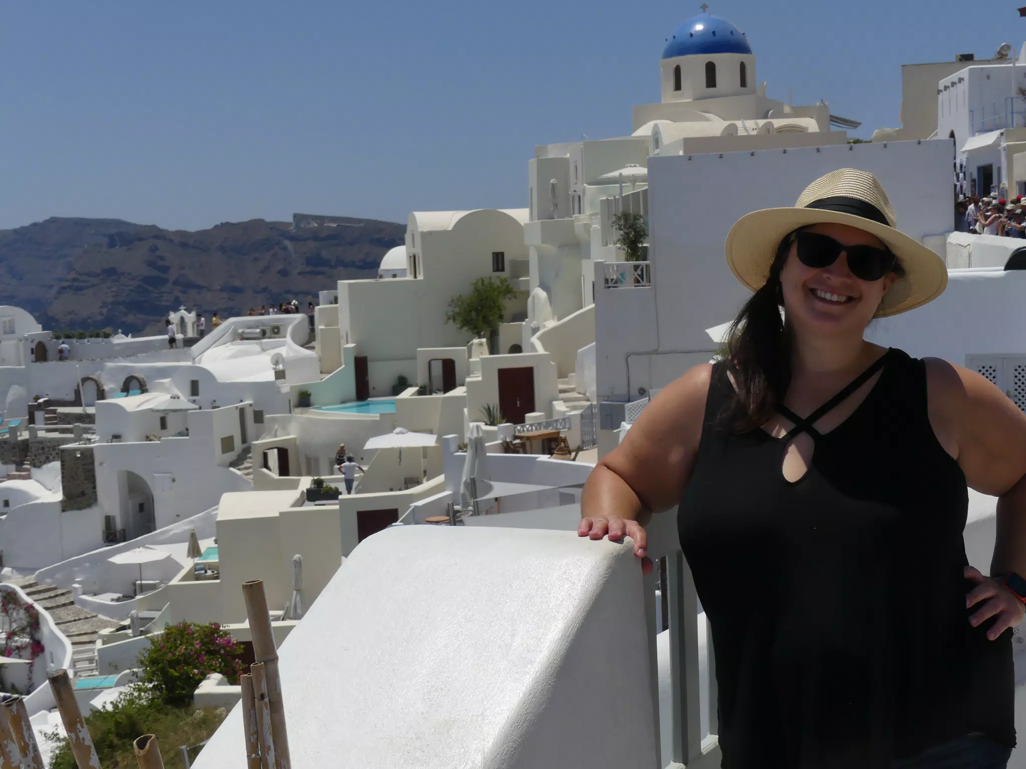 Dominica in Hat in Oia, Santorini