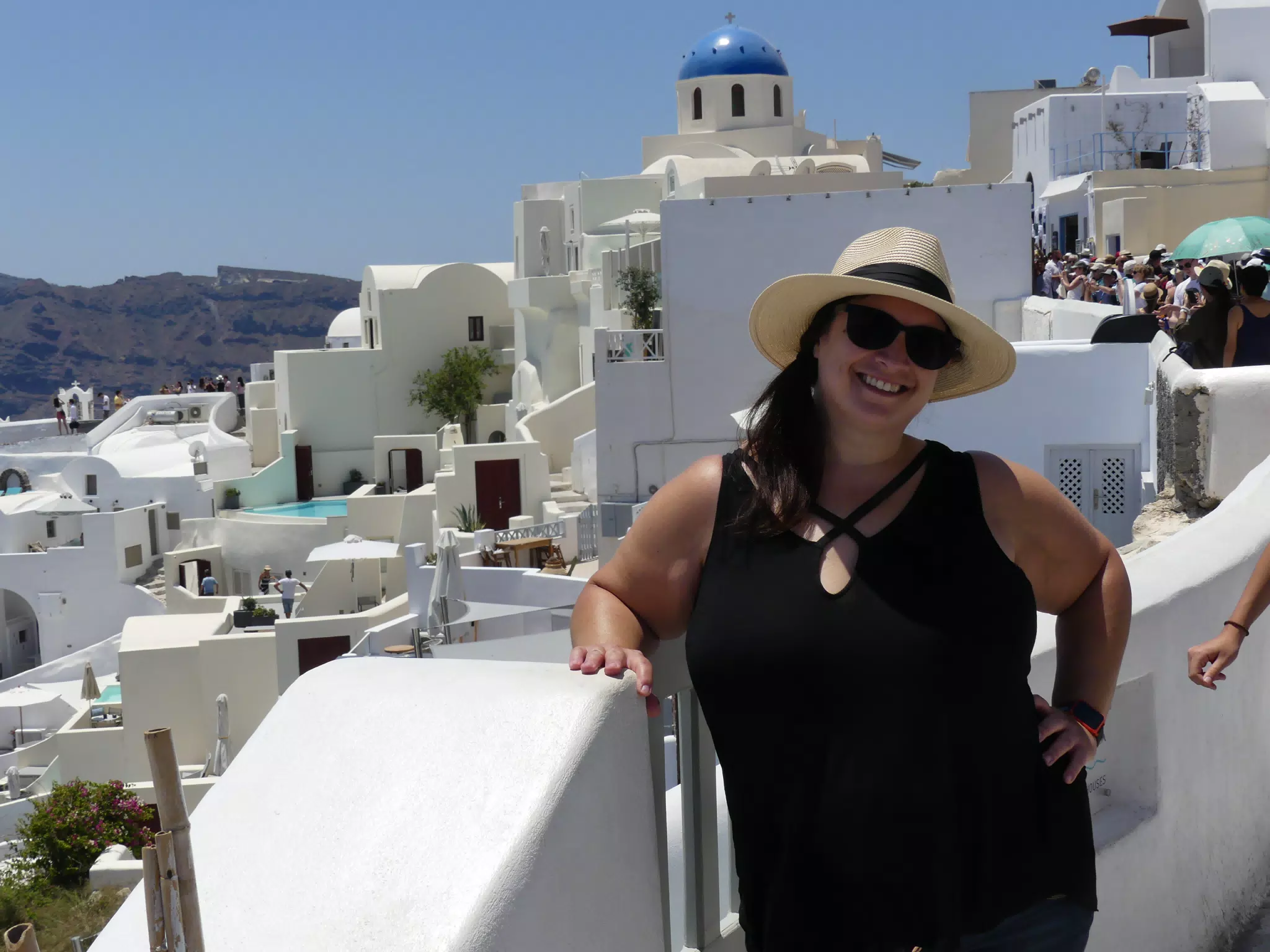 Dominica in Hat in Oia, Santorini