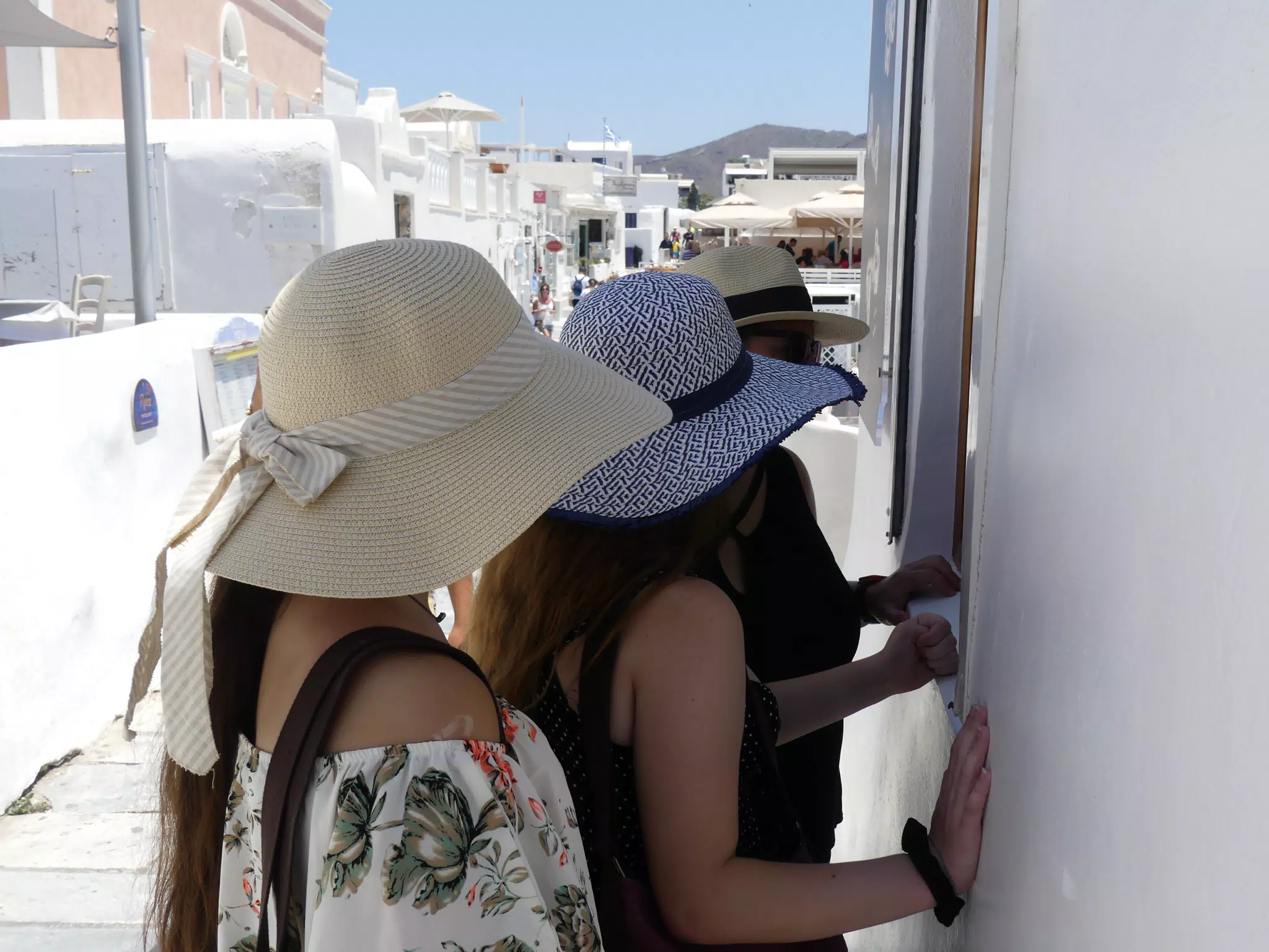 Girls Window Shopping in Oia, Santorini
