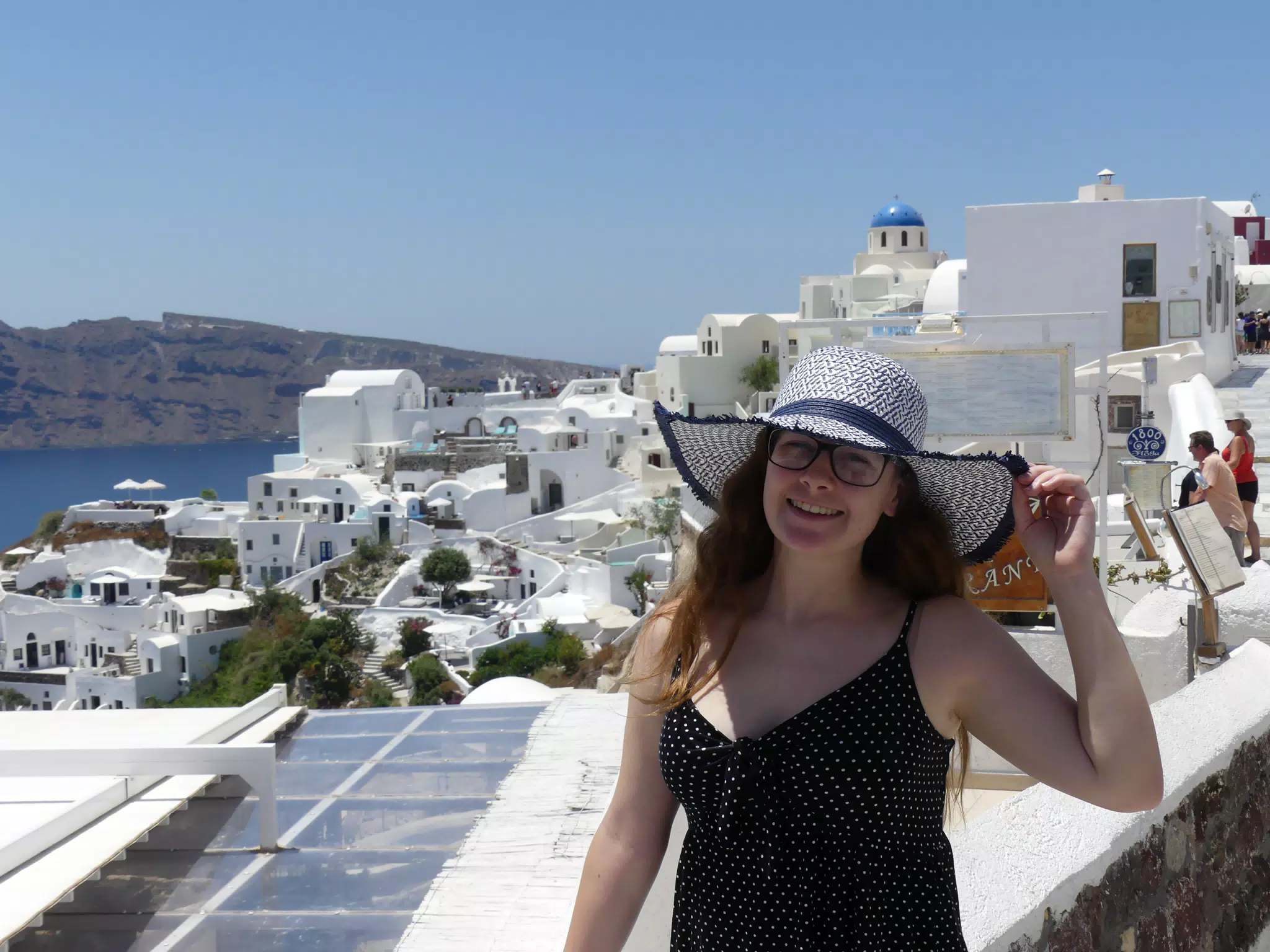 Madeline in Hat in Oia, Santorini